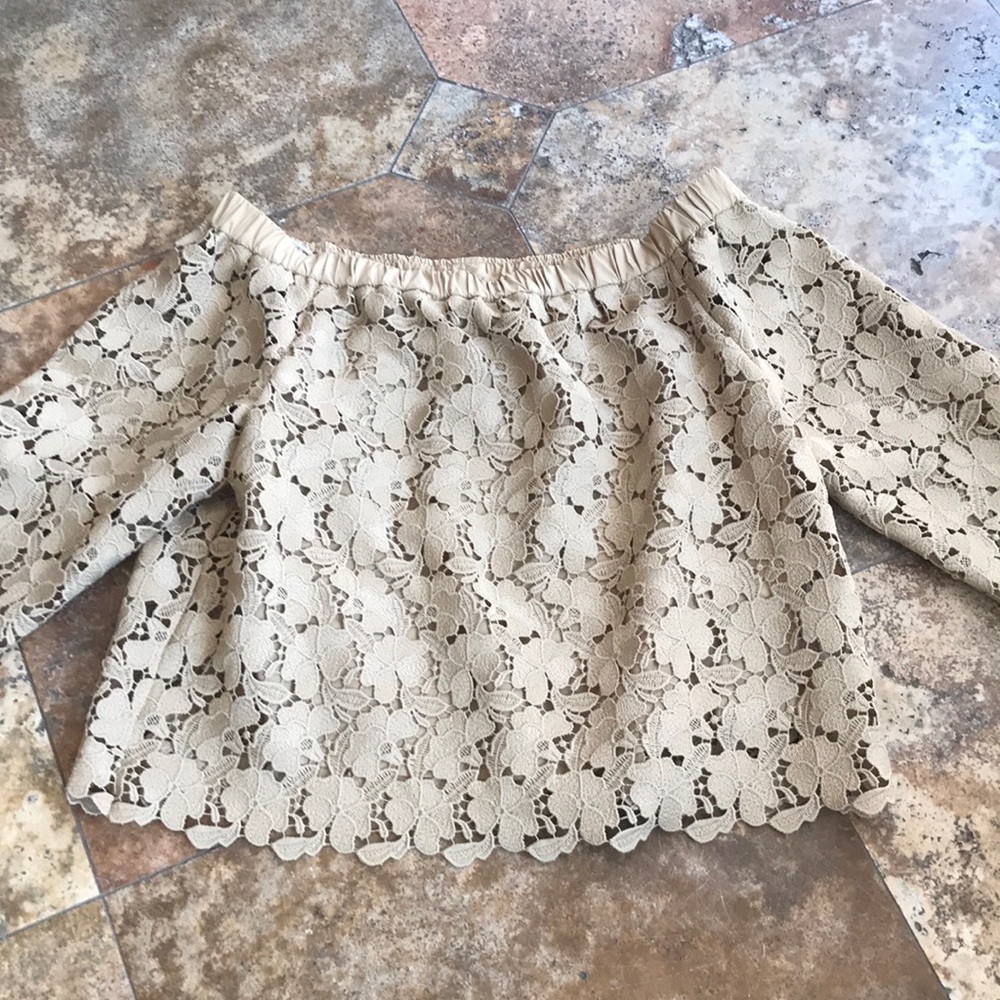 Robert Rodriguez’s amazing work of art. Lacey top with inner linings. Size 12